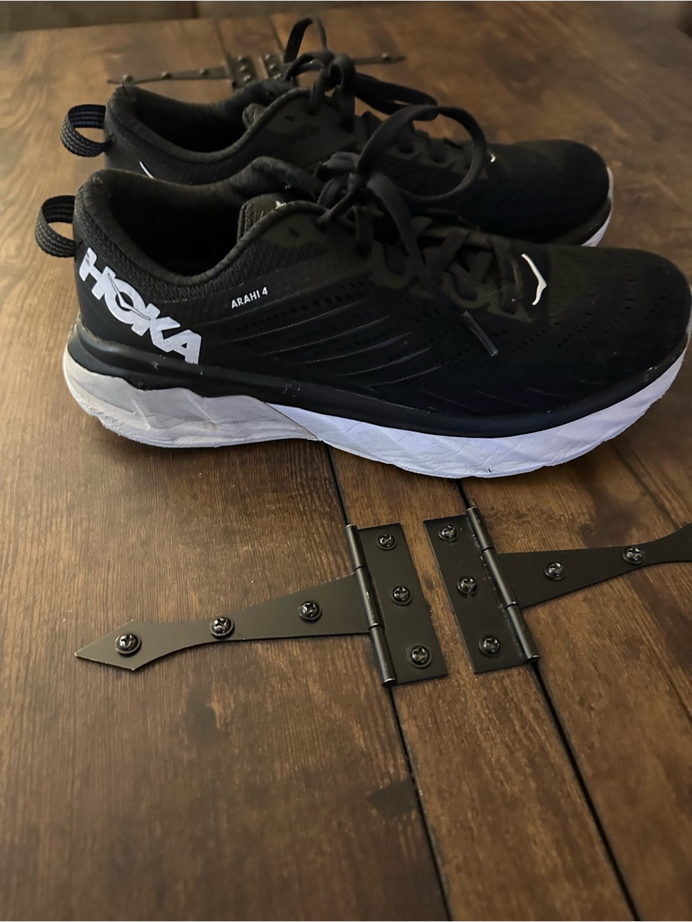 Hoka Black and White Arahi 4 Running Shoes